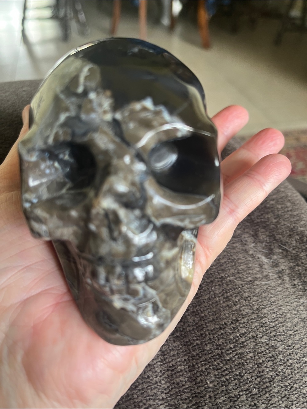 Handheld Polished Brown Stone Skull Sculpture - Decorative Accent